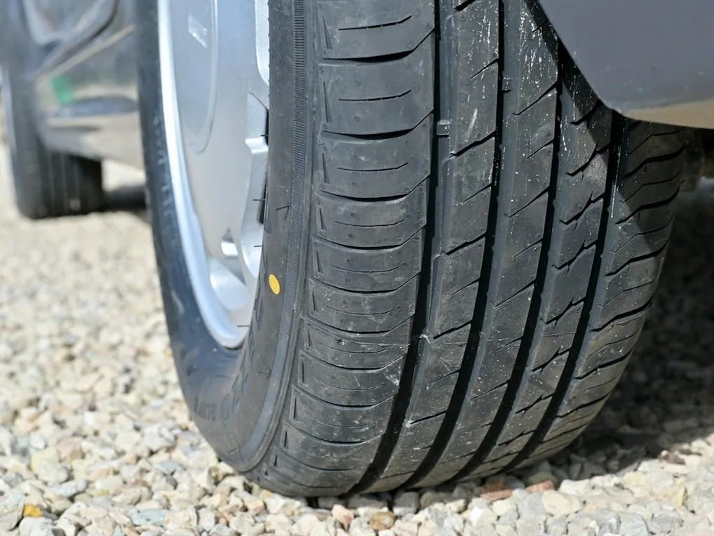 a tyre on a car, close