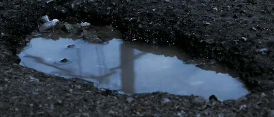 Northampton — pothole with water