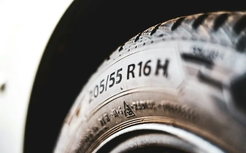 a tyre sidewall with size markings — article card