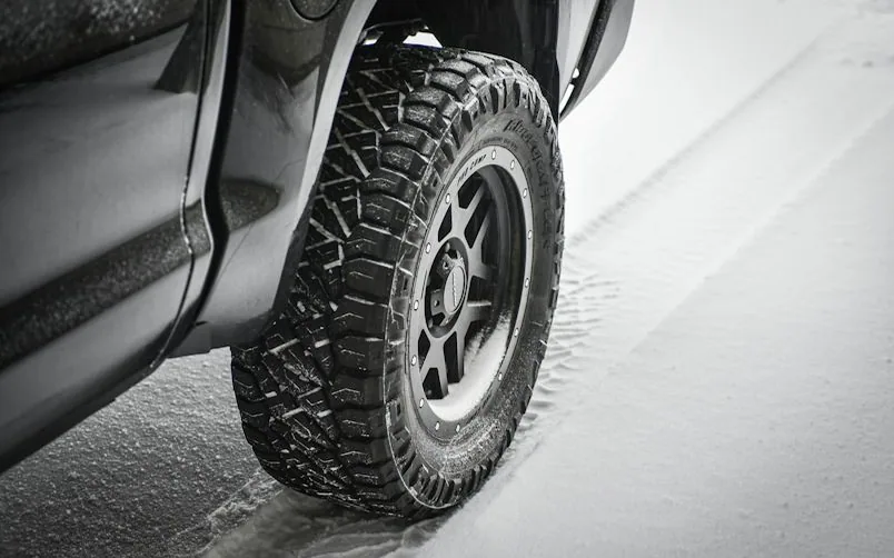 a tyre in snow — article card