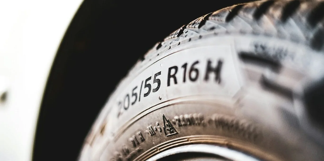 a tyre sidewall with size markings — article card