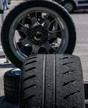 a wheel and fresh tyre ready to fit
